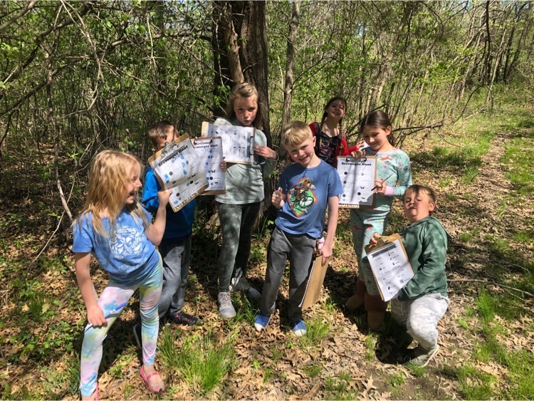 1st grade outside under a tree